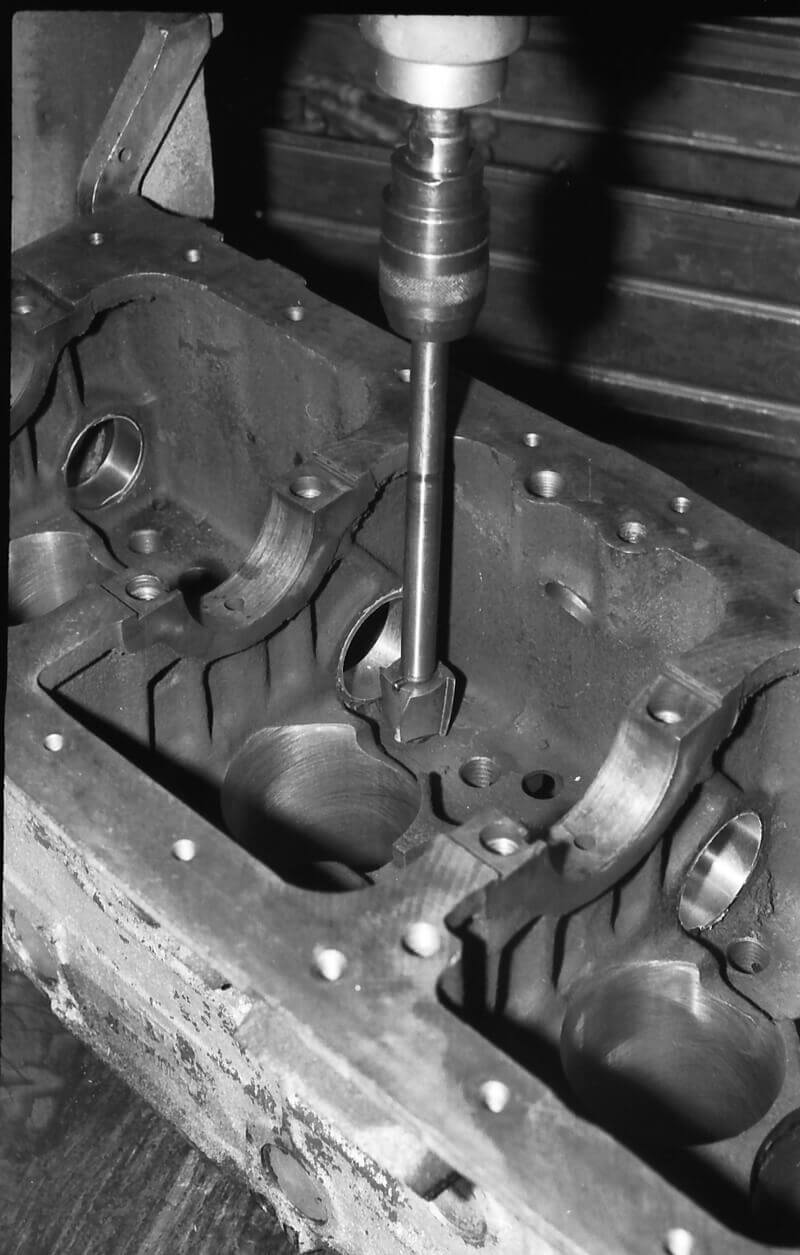 a historic picture of an engine block being worked on in Kuusalu Factory